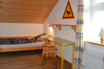 Gruenes Ferienhaus Schlafzimmer